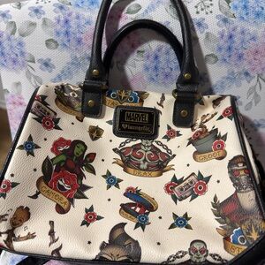 Preloved: Store try on Loungefly Marvel Black and Cream Satchel